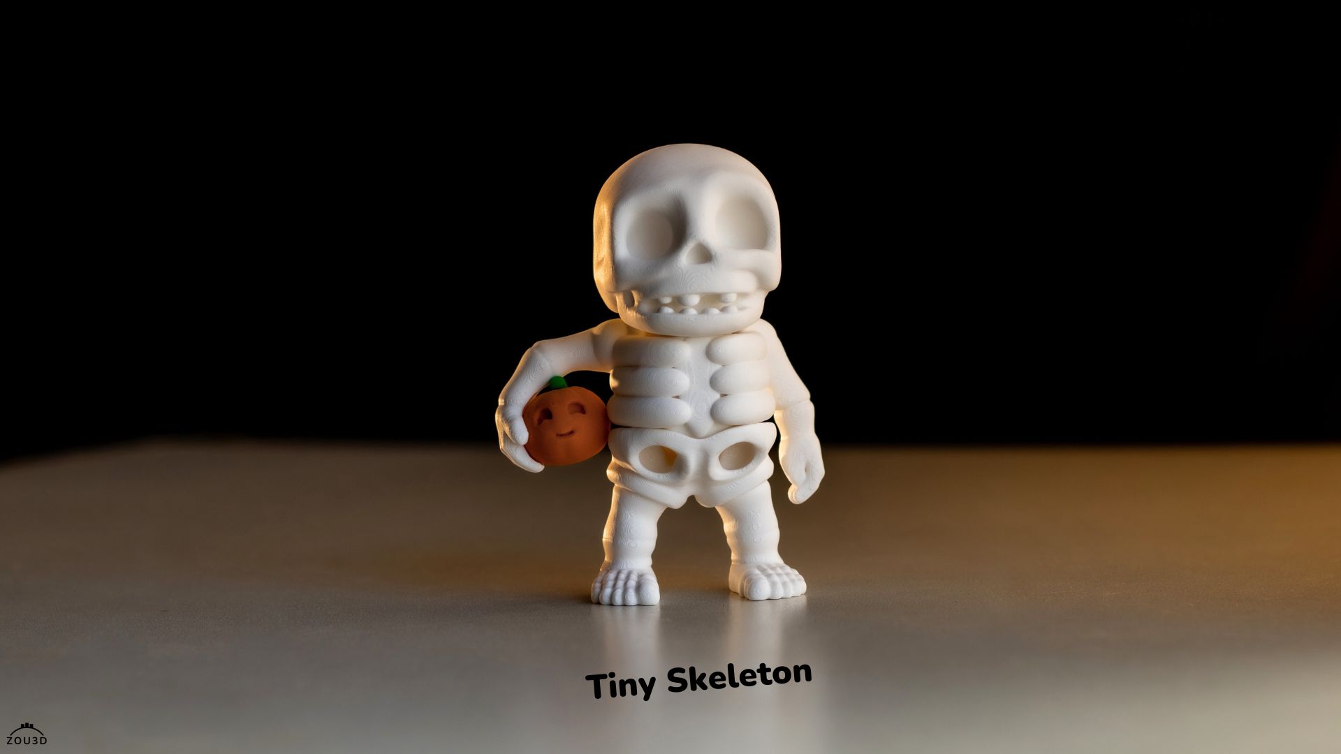 tiny skeleton holding pumpkin